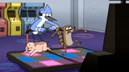 S7E13.023 Rigby and Applesauce Playing