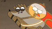 S5E24Rigby Struggling with Monkey Benson
