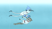 S4E20.189 Mordecai and Rigby Struggling in the Death Tube