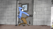 S4E17.237 Mordecai and Rigby Trying to Open the Meat Locker