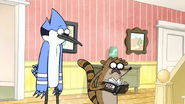 S8E23.288 Rigby Looking Through the Pops Packet