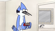 Mordecai holding the diary with two hands