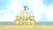 S5E25Rigby on a Sandcastle