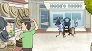 S6E19.066 Mordecai and Rigby Walking by Mobe's Robes