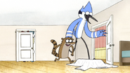 S3E34.090 Mordecai and Rigby Running to the Shirt