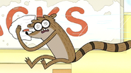 S7E11.109 Rigby Wiping the Snack Bar Sign
