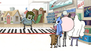 S6E05.055 Muscle Man on a Giant Toy Piano Mat