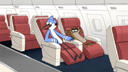 S6E13.214 Mordecai and Rigby on a Plane