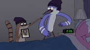 S5E20.041 Rigby Showing Kid Benson Photo to Mordecai