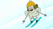 S8E23.060 Muscle Man Skiing Down