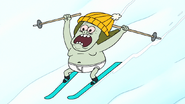 S8E23.061 Muscle Man Skiing Down Fast