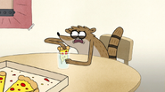 S6E27.065 Rigby Dipping His Pizza in Water