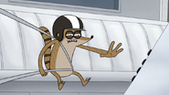 S4E21.233 Rigby Reaching for the Red Button