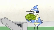 Mordecai wearing a tennis shirt and sweatband briefly during the montage in "Maellard's Package"