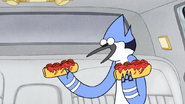 S4E21.012 Mordecai Holding Two Meatball Subs