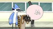 S4E26.057 Rigby Taking a Picture of Thomas' Brain Freeze