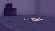 S7E24.051 Rigby Rolling on His Bed