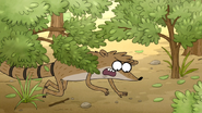 S5E07.016 Rigby Moving Through the Trees