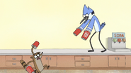 S7E09.051 Mordecai Shooting Rigby From the Counter