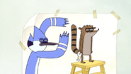 S4E16.079 Mordecai and Rigby Glaring at Quips