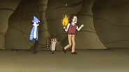 S4E17.117 Gregg Leading Mordecai and Rigby to the Other Cavemen