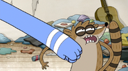 S3E34.118 Mordecai Punching Rigby in the Face