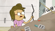 S8E01.071 Eileen Holding a Rebar