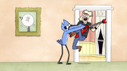 S8E23.161 Mordecai Grabbing Rocker Caroler