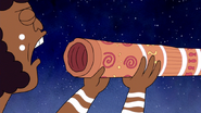 S6E13.092 Wally Tharah About to Blow on a Didgeridoo