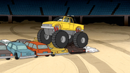 S6E05.051 Muscle Man Driving a Monster Truck