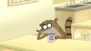 S7E06.051 Rigby Drinking Out of Mordecai's Gift