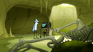 S6E19.155 Mordecai and Rigby Looking at Tim and Mark's Corpses