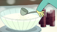 S6E10.162 Some Guy Making a Ladle Fly