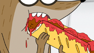 S4E21.014 Rigby Taking a Bite of a Meatball Sub