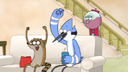 S4E20.042 Mordecai and Rigby Cheers While Benson isn't Impressed