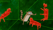 S7E06.242 Rigby Punching the Bug Away