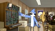 S7E23.010 Mordecai Pointing to the Paper