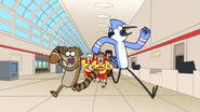 S6E13.186 Mordecai and Rigby Being Chased by the Rugby Team