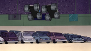 S4E12.041 The Couple Trucks Jumping Over Some Cars