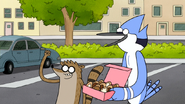 S4E34.058 Mordecai and Rigby Cheering On Muscle Man