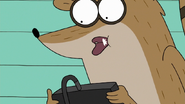 S7E36.018 Rigby Playing a Video Game