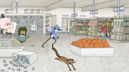 S4E33.083 Rigby Knocking Stuff Over