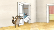 S3E34.085 Rigby Watching the Clothes Go in the Closet