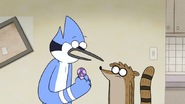S4E36.047 Mordecai Remembering what Benson Said About Party Horns