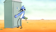 S6E13.057 Mordecai Trying to Get Rigby Out of the Outhouse