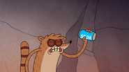 S4E17.011 Rigby Shaking a Can of Soda