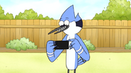 S6E20.060 Mordecai Taking a Picture of the Cake