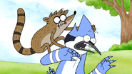 S6E11.106 Rigby Jumping on Mordecai's Back