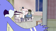 S2E09.081 Mordecai Watching the Guys Watching TV