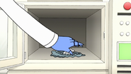 S7E29.110 Mordecai Playing the Shirt in the Machine